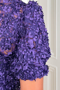 Marmelstein_One_sleeve_purple_flower_embellished_Top.png