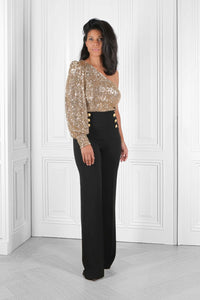 Marmelstein_One_Sleeved_golden_sequined_Top.png